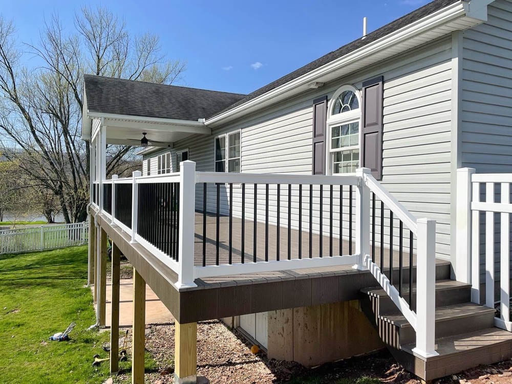Brown Deck With White Railing 